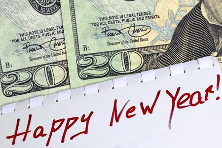 Happy New Year 2020 greeting card with 20 dollar bills.の写真素材