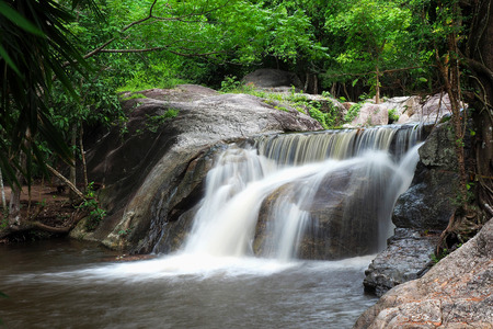 Waterfall flows down the rock. holidayの写真素材