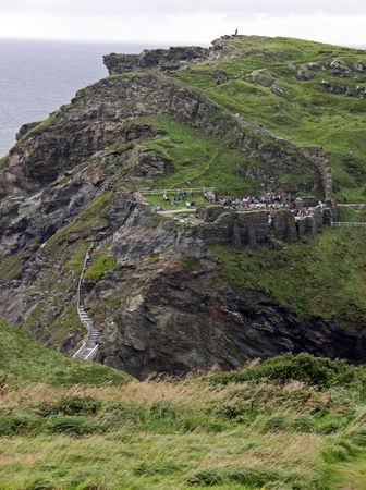 View of Tintagel castle in Cornwall, UK on cliff topの写真素材