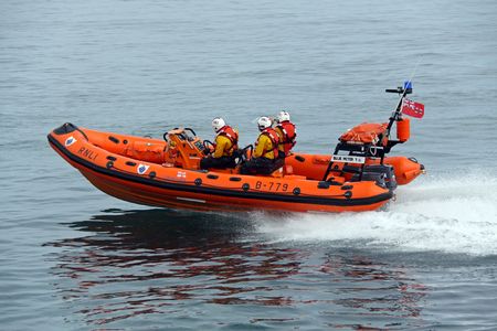 Worthing Pier, Worthing, UK, 28th June 2009 lifeboat / life boat practice display of the UK R.N.L.I. coastguard on manoeuvresのeditorial素材