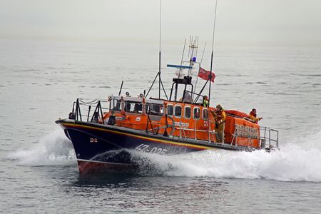 Worthing Pier, Worthing, UK, 28th June 2009 lifeboat / life boat practice display of the UK R.N.L.I. coastguard on manoeuvresのeditorial素材