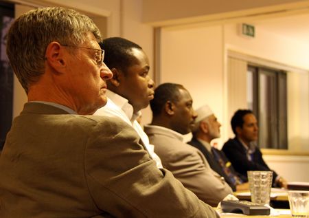 C.V.A. Resource Centre, Croydon, London, UK, 9th September 2009 a vicar and ethnic religious people at the Faiths Together Group Meetingのeditorial素材