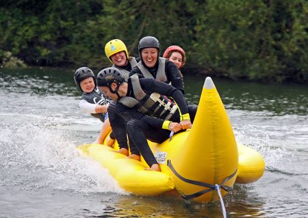 Heron Lake, Wraysbury, UK 1st August 2009 people on a banana boat at the British Disabled Water Ski-ing Association BDWSAのeditorial素材