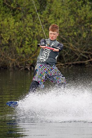 Heron Lake, Wraysbury, UK April 25th 2010 A boy Wake Boarder / wakeboarding at the British Disabled Water Ski-ing Association BDWSAのeditorial素材
