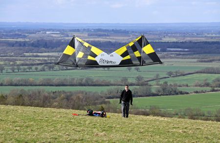 White Horse Hill, Uffington, UK 4th April 2010 a man flying a stunt kite on the Berkshire Downsのeditorial素材