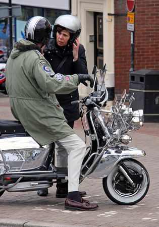 Hastings UK, May 3rd 2010, a Mod and scooter at the Annual May Day Weekend Biker meet-up, Hastings Seafrontのeditorial素材