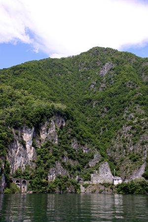Scene of tree covered mountains and Lake Como in Italyの写真素材