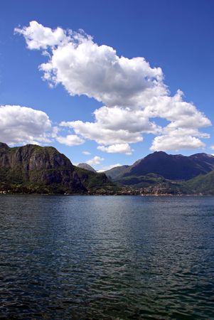 Scene of tree covered mountains and Lake Como in Italyの写真素材