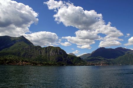 Scene of tree covered mountains and Lake Como in Italyの写真素材