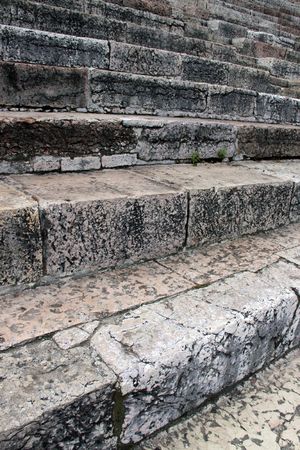 Ancient rock steps showing cracked stone and detailの写真素材