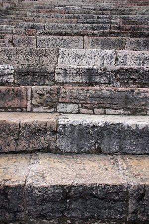 Ancient rock steps showing cracked stone and detailの写真素材