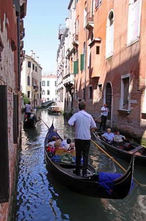 Venice, Italy, 21/5/10 Italian gondoliers and tourists in gondolas on a Venice waterwayのeditorial素材