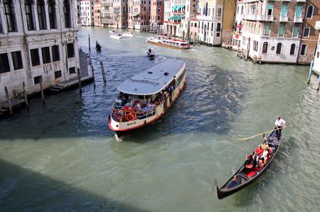 From the Rialto Bridge, Venice, Italy, 21/5/10 tourist river boats and gondola and gondolierのeditorial素材