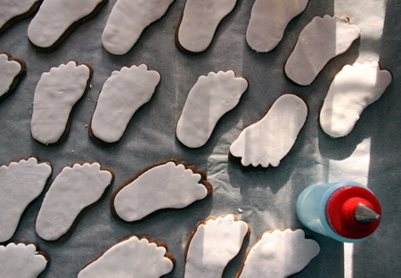 Foot shaped biscuits cooked for a babies baptismの写真素材