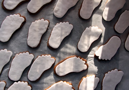 Foot shaped biscuits cooked for a babies baptismの写真素材