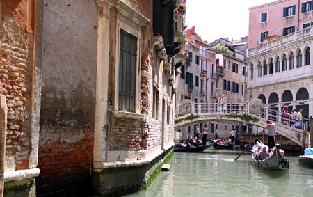 Venice, Italy, 21/5/10 Italian gondoliers and tourist passengers in gondolas on a Venetian canalのeditorial素材