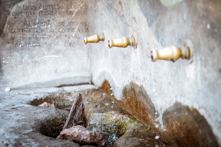 Public fountain located in the village of Enix.の写真素材