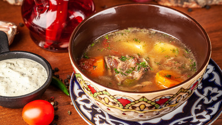 Traditional Uzbek oriental cuisine. soup with lamb meat. Copy space, selective focusの写真素材