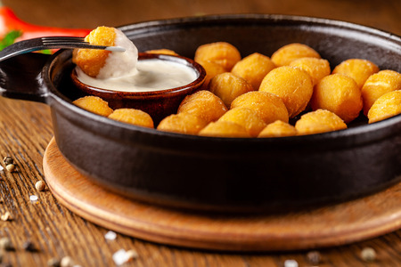 Czech cuisine concept. Potato croquettes. Balls of mashed potatoes, breaded, deep-fried in a cast...