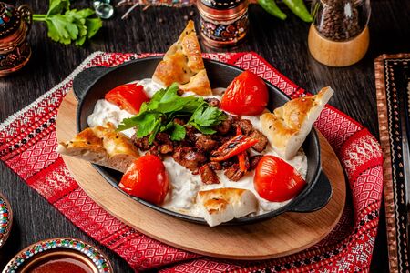 Traditional Turkish, Arabic cuisine. Ali Nazik Kebab. Chopped  lamb with eggplant, yogurt and garlic. Ottoman food. Serving dishes in the restaurant. copy spaceの写真素材