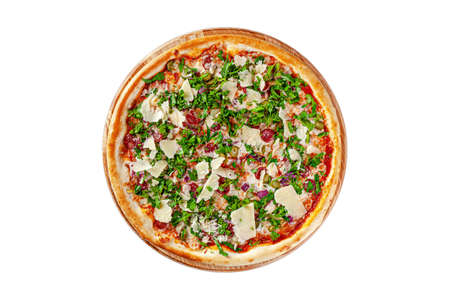 Italian cuisine. Round thin pizza on a wooden board, on a white background. Image is isolated. Top view.の写真素材