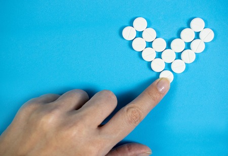 Medical background with multi-colored packs of pills. ?oncept pharmacy, clinic, drugs, headache...