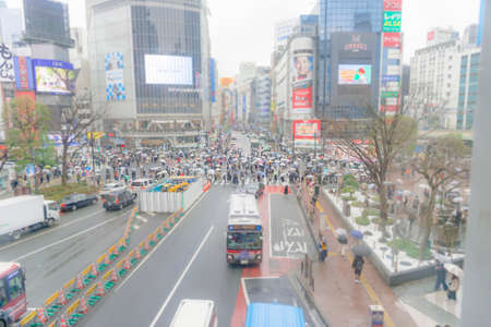 Scramble intersection in Shibuya-ku, Tokyo on a rainy dayのeditorial素材