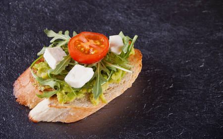 Sliced Toast Bread on a plate with vegetablesの写真素材