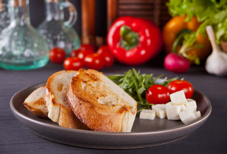 Sliced Toast Bread on a plate with vegetablesの写真素材