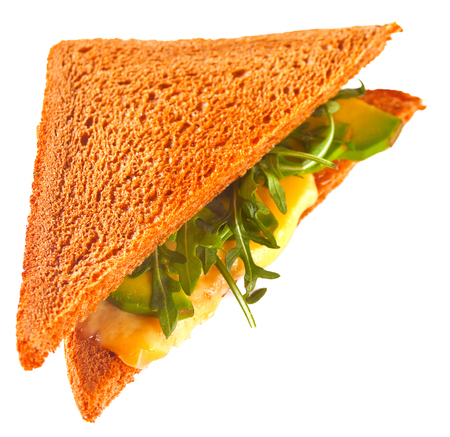 Isolated Sandwich with turkey breast, cheese, lettuce, arugula, tomatoes and onionの写真素材