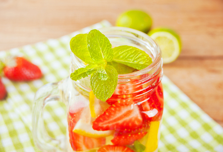 Strawberry Lemonade or mojito cocktail with lemon and mint, cold refreshing drink or beverage with ice.の写真素材