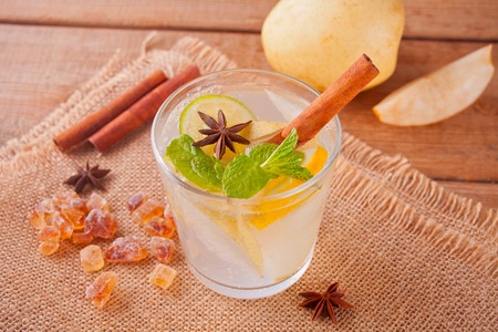 Lemonade or mojito cocktail with lemon and mint, cold refreshing drink or beverage with ice.の写真素材