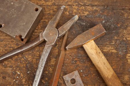 Collection of vintage carpentry tools on an old workbench: woodworking, craftsmanship and handwork...