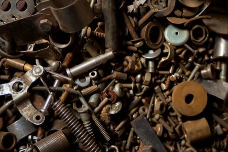 Detail of different metallic old vintage bolts and nutsの写真素材