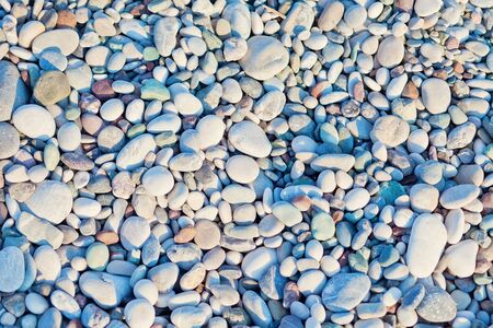 Sea stones background. Abstract background with pebbles.の写真素材