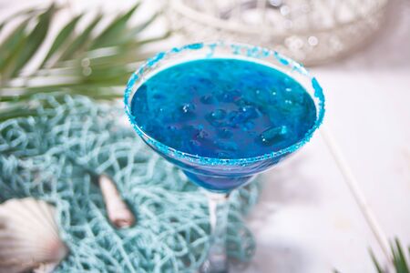 Glass of blue cocktail. Hawaiian cocktai, lagoon cocktail, curacao. Marine themeの写真素材