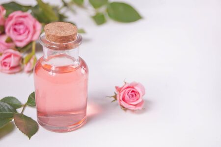 Aroma rose water for skincare, essential oils, spa beauty care. Copy space.の写真素材