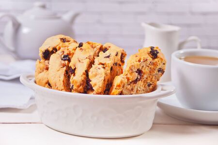 Italian biscotti and cup of coffee on the backgroundの写真素材