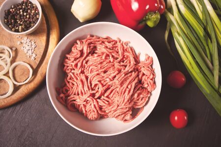 Fresh Raw mince. Minced beef in a white bowl. Top view.の写真素材