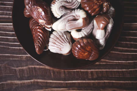 a lot of variety chocolate pralines in a plate.の写真素材