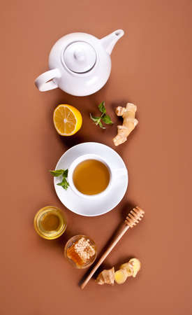 Refreshing ginger tea with lemon, mint leaf and honey