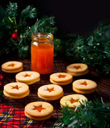 Traditional Austrian Christmas cookies Linzer biscuits filled with apricot jamの写真素材