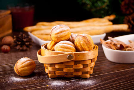 Homemade fresh cookies in a shape of nuts with condensed milkの写真素材