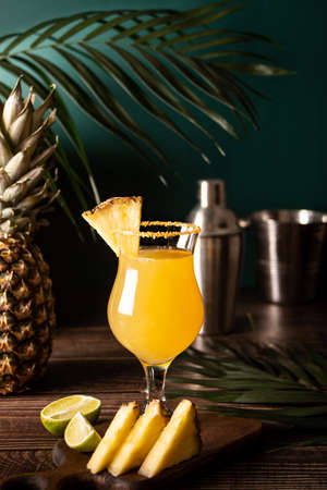 Pineapple cocktail. Summer refreshing tropical drink with pineapple juice and tequila.の写真素材