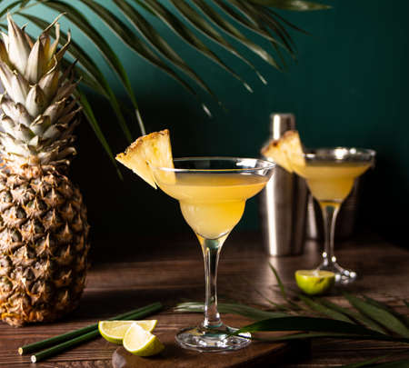 Pineapple margarita cocktail. Summer refreshing tropical drink with pineapple juice and tequila.の写真素材