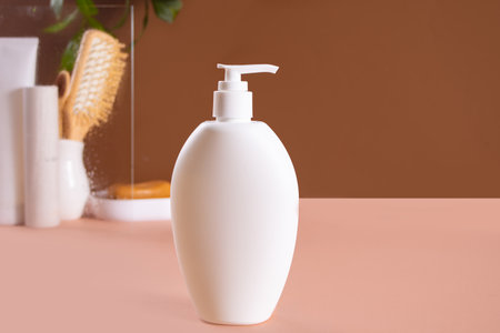Blank mock up bottle beauty cosmetic skin care organic product for bathing routine on brown background. Place your design.の写真素材