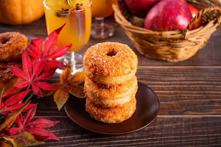 Sweet homemade apple cider donuts with cinnamon sugar. Autumn food.の写真素材
