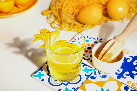 Cool fresh lemonade with lemons fruit. Summer detox refreshing drink water.の写真素材