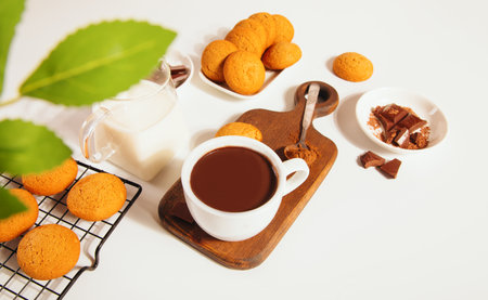Hot chocolate with chocolate pieces and cookies.の写真素材