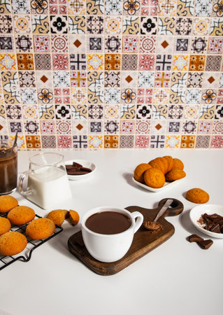 Hot chocolate with chocolate pieces and cookies.の写真素材